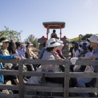 a group of people on a tractor wagon