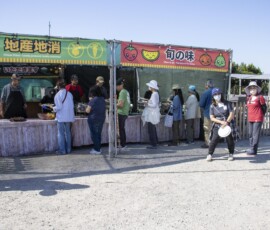people waiting in front of a booth