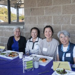 a group of women smiling