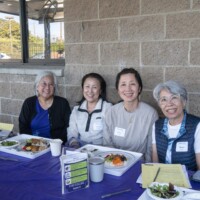 a group of women smiling