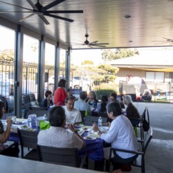 group of people eating at tables