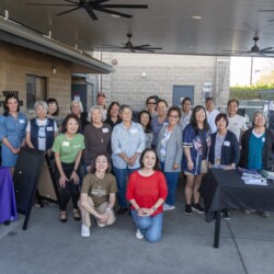 a group of people posing for the camera