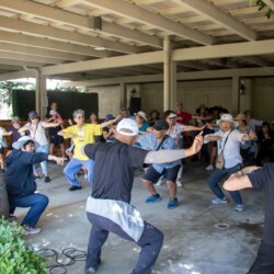 a group of people exercising together
