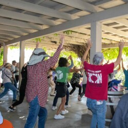 a group of people exercising together