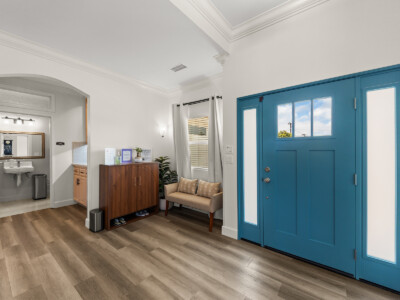 blue door with furniture and a bathroom