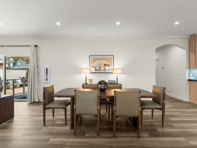 large brown dining room table in dining room