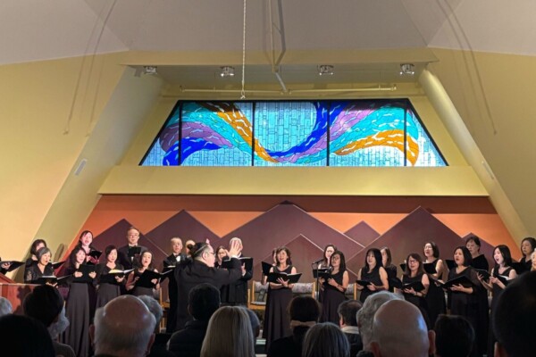 choir group on stage singing