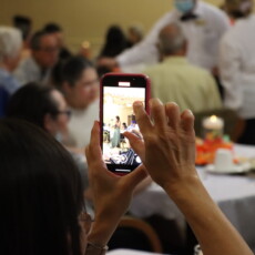 person taking a photo on phone