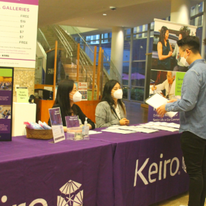 Attendees at registration table