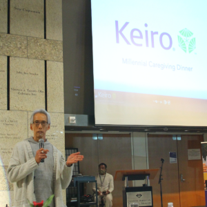 Dr. Komatsu talking to crowd