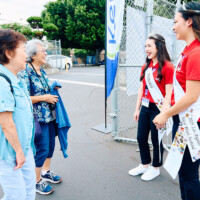 M PALMA PHOTO 2025 two nisei week court members talking to two women