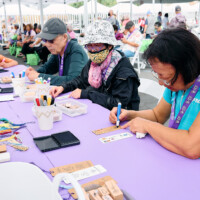 M PALMA PHOTO 2025 three attendees doing stamping craft