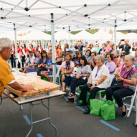 M PALMA PHOTO 2025 Brian Kito of Fugetsu-Do making mochi in front of crowd