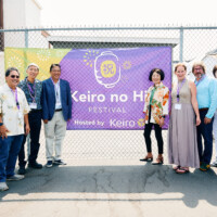 M PALMA PHOTO 2025 group of people posing in front of Keiro no Hi Festival sign