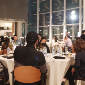 Attendees sitting at table