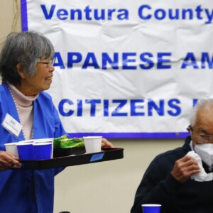 volunteer serving beverages