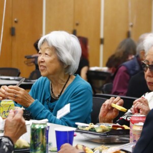 attendees eating bento