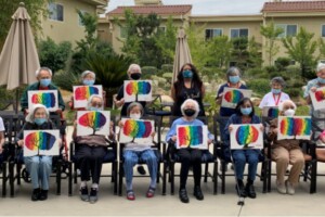 A tree with rainbow-colored leaves - Residents of Nikkei Senior Gardens