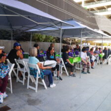 a group of people sitting and watching