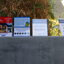 four sponsor signs of event
