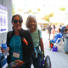 two woman smiling