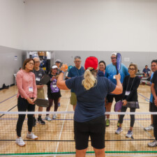 woman instructing a group