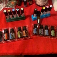 small oil tubes on red table