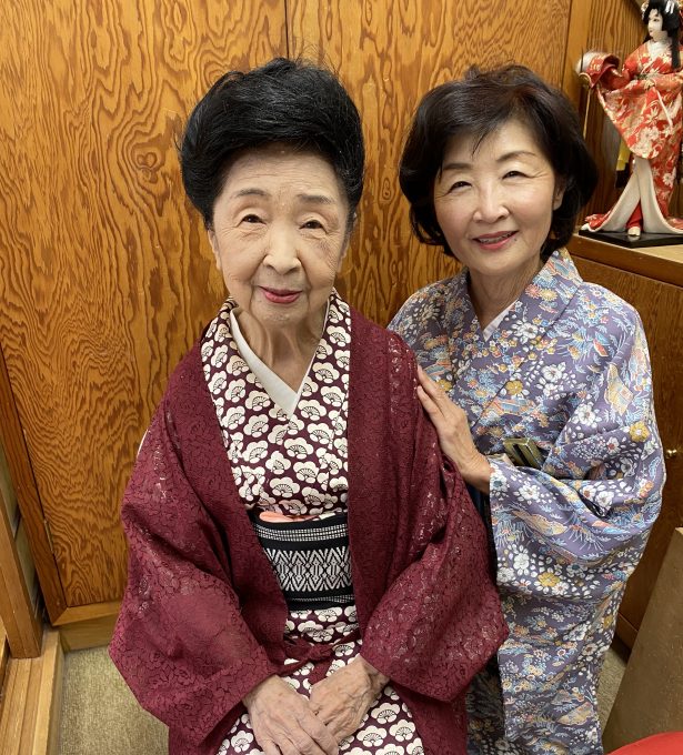 fujima kansuma smiling into camera