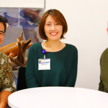 iyashi care doctor, nurse, and social worker smiling into camera
