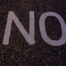 the word no writen on asphalt