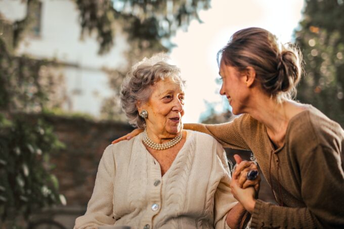 older adult with younger woman